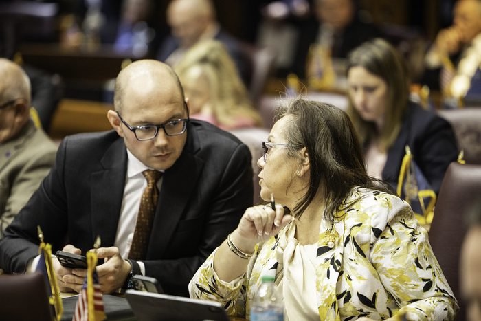 Rep. Teshka collaborating with colleagues